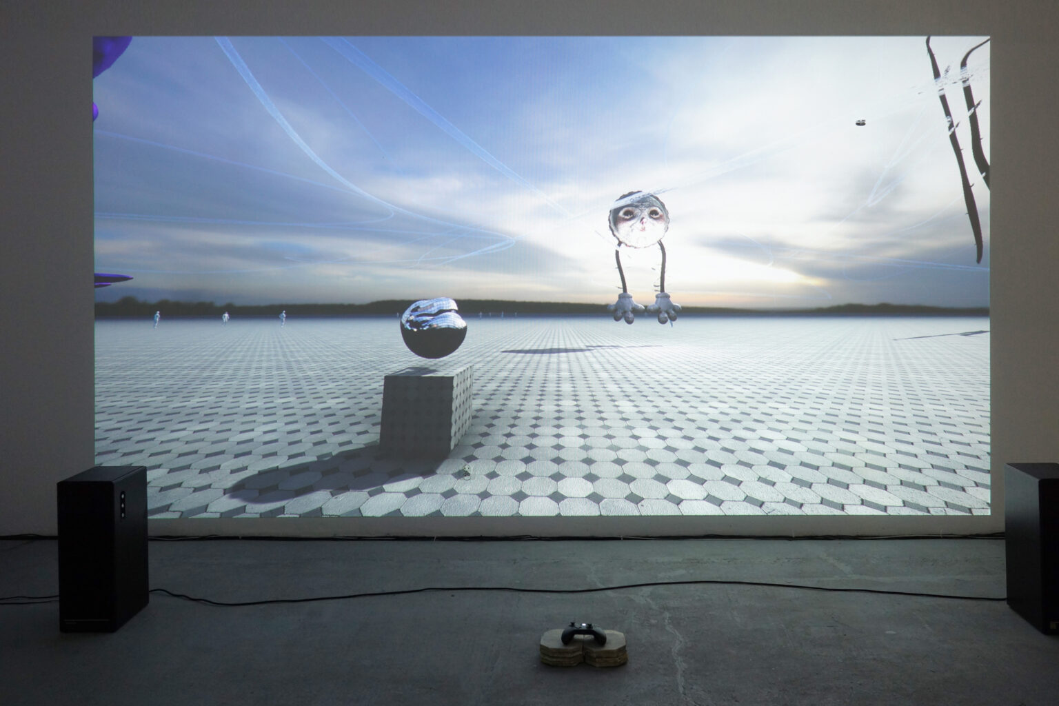 widok wystawy końcoworocznej, duża projekcja na ścianie, scena 3D